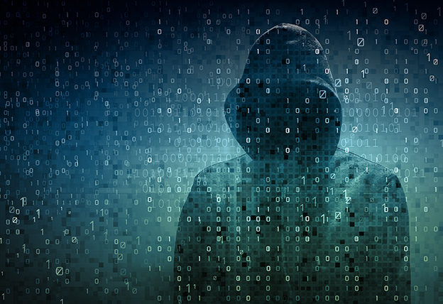 hacker over a screen with binary code