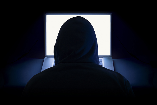 Hacker with laptop